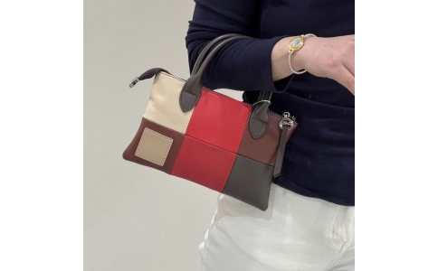 Woven hand - carry and cross - body bag